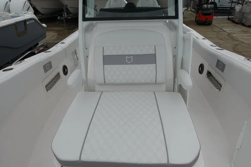 Slide: The Image of 2025 Sea Fox 268 Commander boat interior with white cushioned seating. - 20
