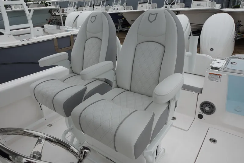 Slide: The Image of 2025 Sea Fox 268 Commander boat seats, featuring luxurious gray upholstery and ergonomic design. - 24
