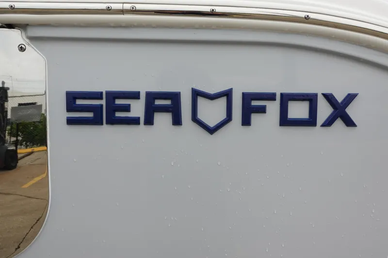 Slide: The Image of Sea Fox 268 Commander 2025 logo on boat exterior. - 25