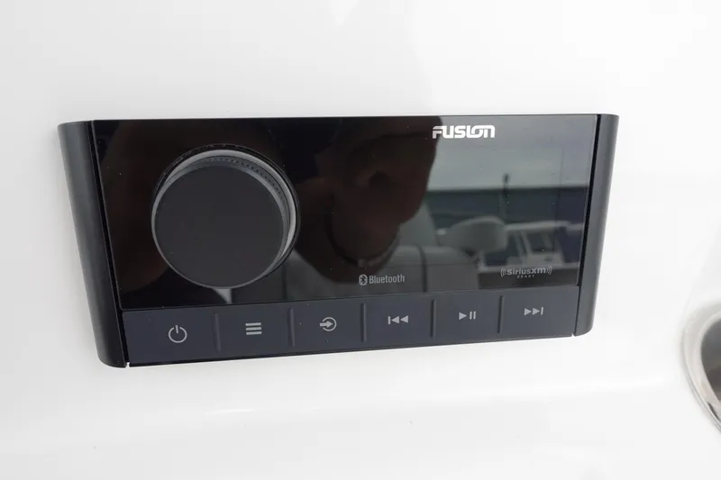 Slide: The Image of Fusion Bluetooth audio system on 2025 Sea Fox 268 Commander boat dashboard. - 5