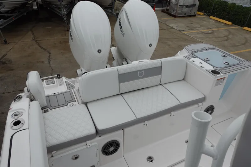 Slide: The Image of 2025 Sea Fox 268 Commander boat with dual engines and cushioned seating. - 8