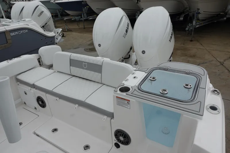 Slide: The Image of 2025 Sea Fox 268 Commander boat with dual engines and spacious seating area. - 9