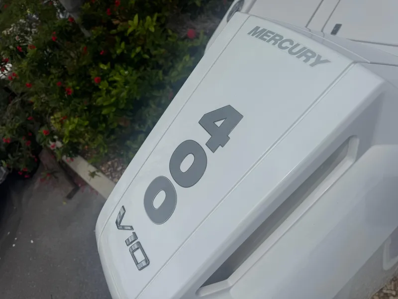 Slide: The Image of 2026 Blackfin 262 HB with Mercury 400 engine, close-up view. - 15