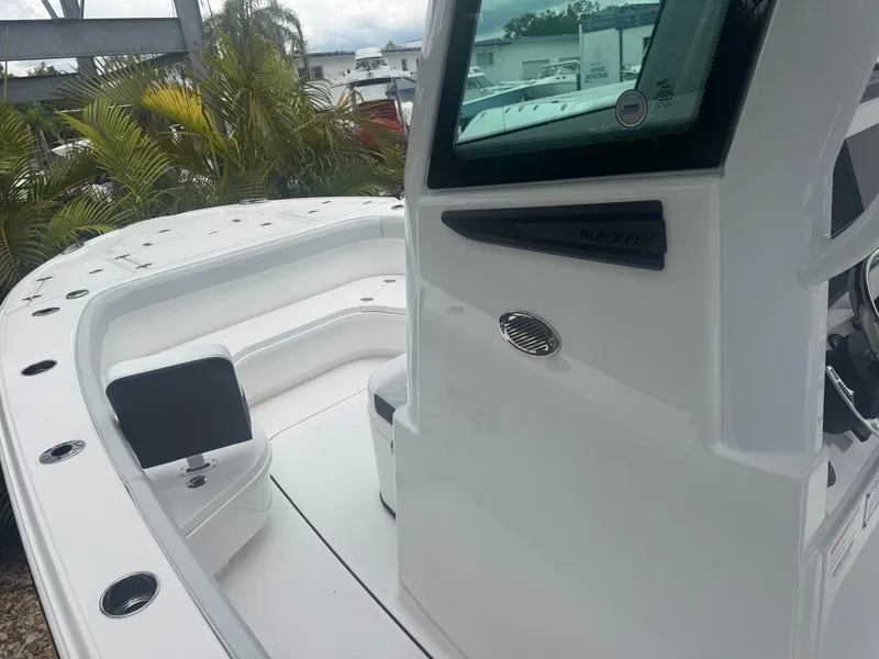 Slide: The Image of 2026 Blackfin 262 HB boat interior with sleek white design and modern features. - 27