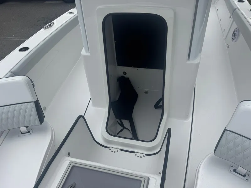 Slide: The Image of 2026 Blackfin 262 HB boat interior with open storage compartment. - 38