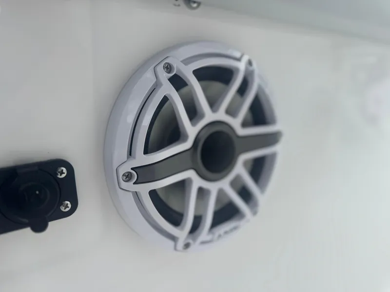 Slide: The Image of 2026 Blackfin 262 HB boat speaker and control panel close-up. - 39