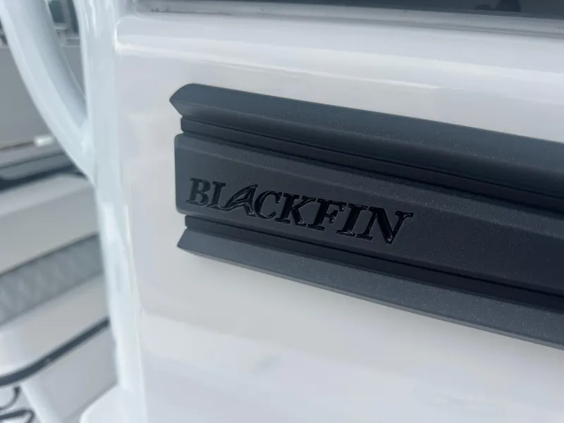 Slide: The Image of 2026 Blackfin 262 HB boat logo on sleek white surface. - 42