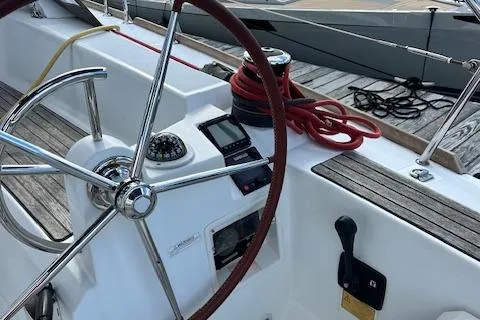 Slide: The Image of Steering wheel and controls of a 2012 Jeanneau Sun Odyssey 379 sailboat. - 15