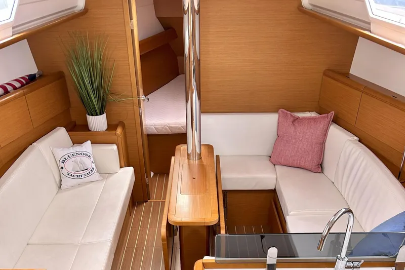 Slide: The Image of Interior of 2012 Jeanneau Sun Odyssey 379 yacht with cozy seating and modern design. - 18