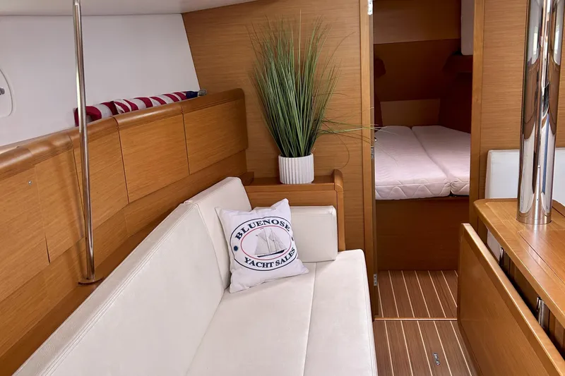 Slide: The Image of Interior of 2012 Jeanneau Sun Odyssey 379 yacht with cozy seating and modern decor. - 22