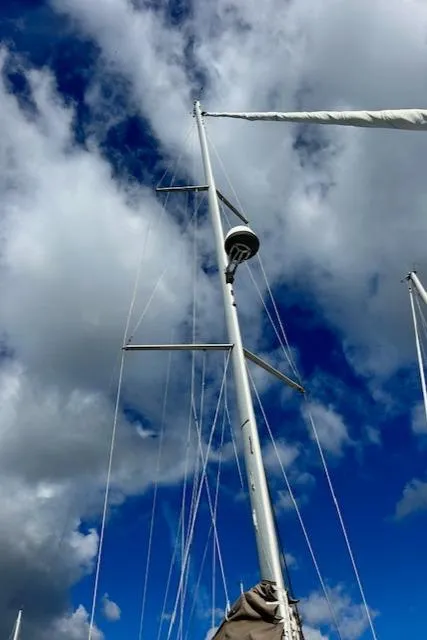 Slide: The Image of Sailboat mast of 2012 Jeanneau Sun Odyssey 379 against cloudy sky. - 4