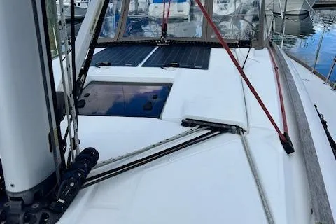 Slide: The Image of 2012 Jeanneau Sun Odyssey 379 sailboat deck with rigging and hatch. - 6