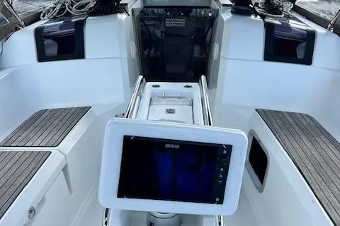 Slide: The Image of Cockpit of 2012 Jeanneau Sun Odyssey 379 sailboat with navigation equipment. - 9