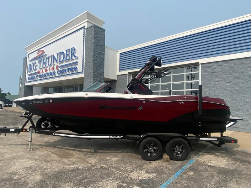 The Image of 2022 MasterCraft X24 boat on trailer at Big Thunder Marine Center. - 2