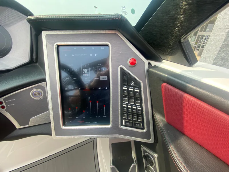 Slide: The Image of 2022 MasterCraft X24 dashboard with touchscreen controls and sleek design. - 38