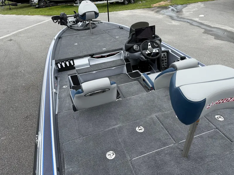 Slide: The Image of 2026 Phoenix 721 ZXL boat interior with modern seating and navigation system. - 10