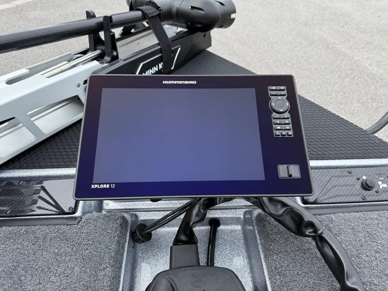 Slide: The Image of 2026 Phoenix 721 ZXL boat with Humminbird Xplore 12 fishfinder and Minn Kota trolling motor. - 7