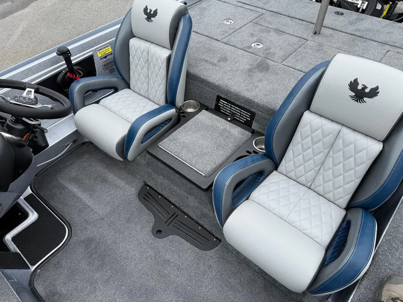 Slide: The Image of 2026 Phoenix 721 ZXL boat interior with two cushioned seats and steering wheel. - 9