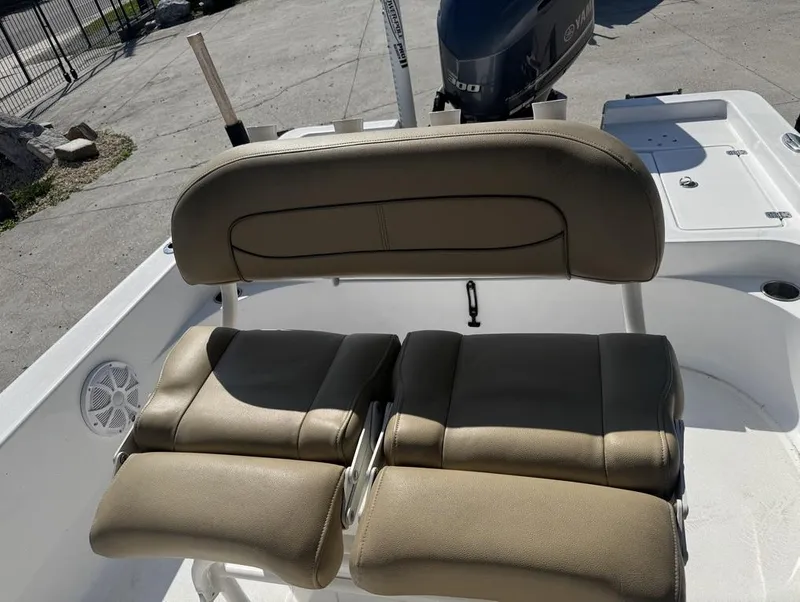 Slide: The Image of 2017 Sportsman Masters 247 Bay Boat with tan seating and Yamaha outboard motor. - 12
