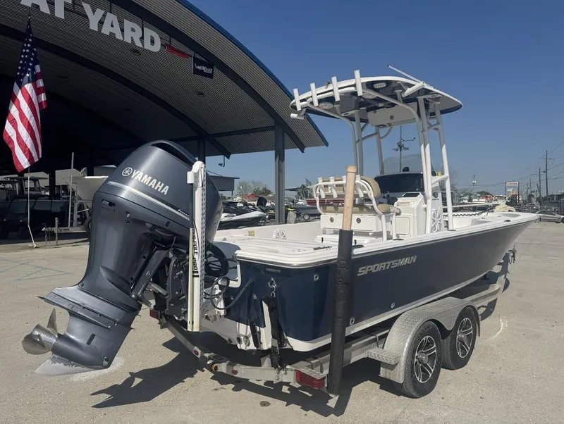 Slide: The Image of 2017 Sportsman Masters 247 Bay Boat with Yamaha engine at a boat yard. - 8