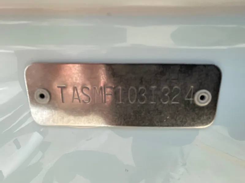 Slide: The Image of 2024 Aquasport 230 Pro Bay identification plate with serial number. - 29