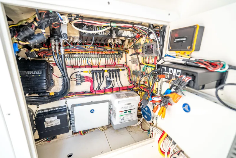 Slide: The Image of Electrical system of a 2014 SeaVee 34 boat, showcasing wiring and components. - 26