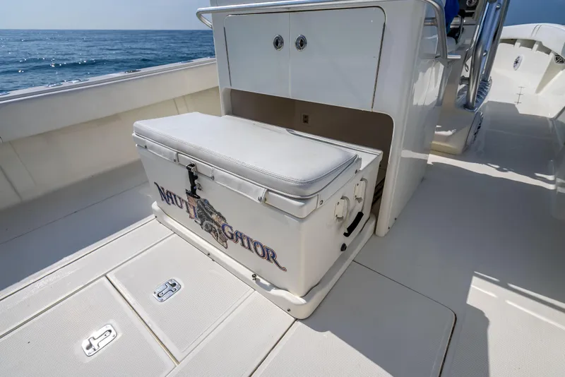 Slide: The Image of 2014 SeaVee 34 boat interior with storage and cooler on deck. - 37