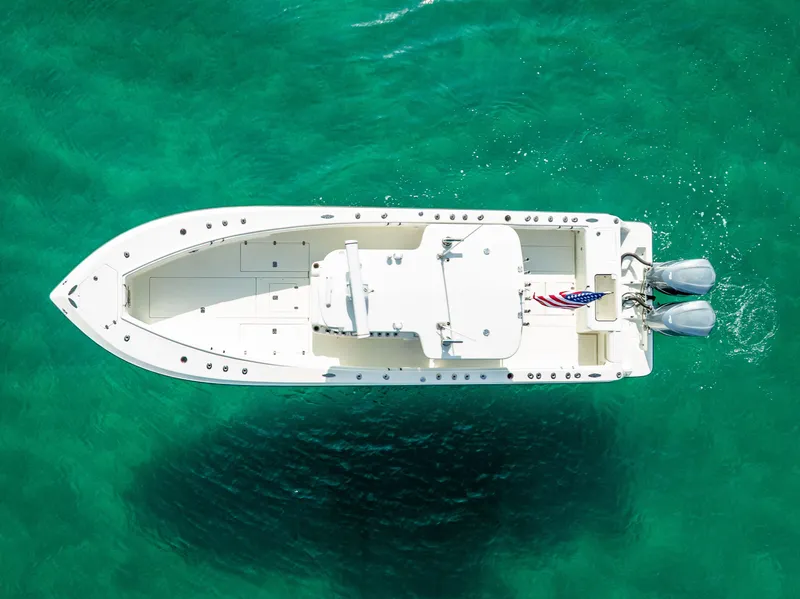 Slide: The Image of Aerial view of 2014 SeaVee 34 boat on clear turquoise water. - 9