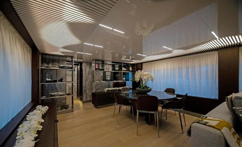 Slide: The Image of Luxurious interior of 2018 Ferretti Yachts 850 Motoryacht with elegant dining area and modern decor. - 7