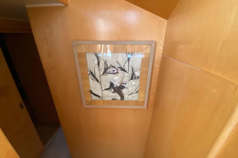 Slide: The Image of Interior of 1998 Navigator 5300 Classic yacht with wooden finishes and large windows. - 18