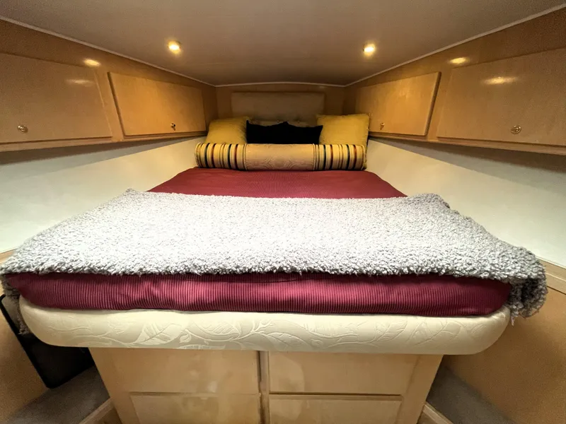 Slide: The Image of Luxurious head in 1998 Navigator 5300 Classic yacht with elegant lighting and marble countertop. - 20