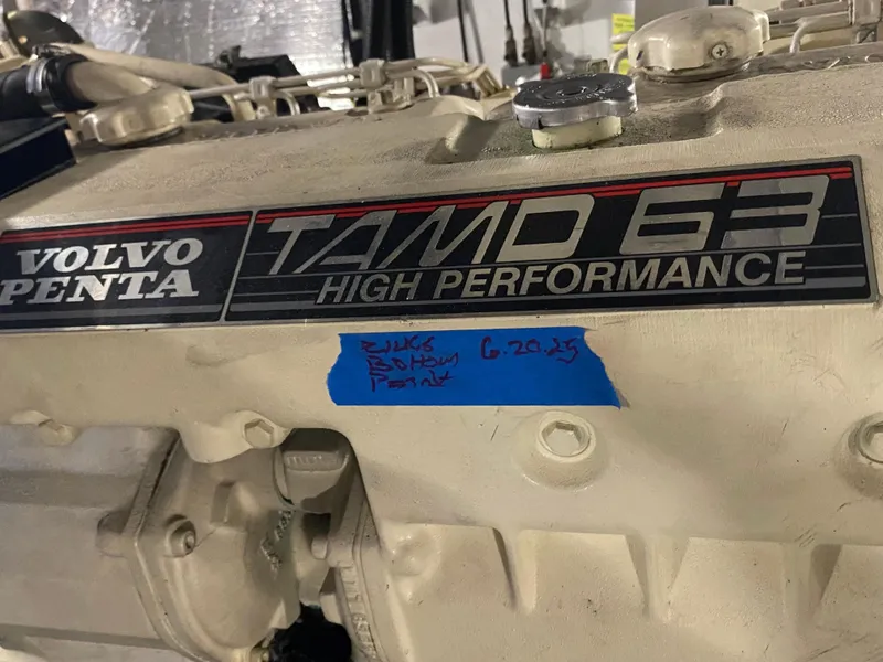 Slide: The Image of Bow view of 1998 Navigator 5300 Classic yacht in a marina setting. - 36