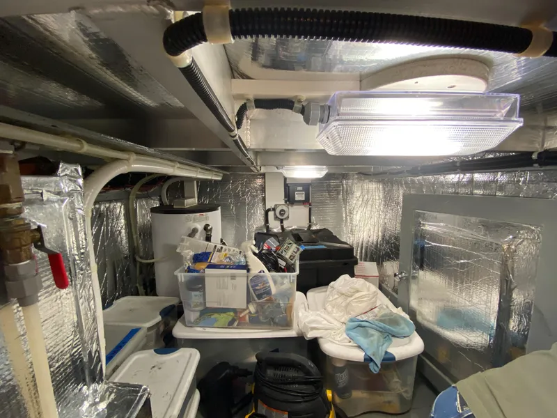 Slide: The Image of Engine room of 1998 Navigator 5300 Classic with fuel system components and gauges. - 40