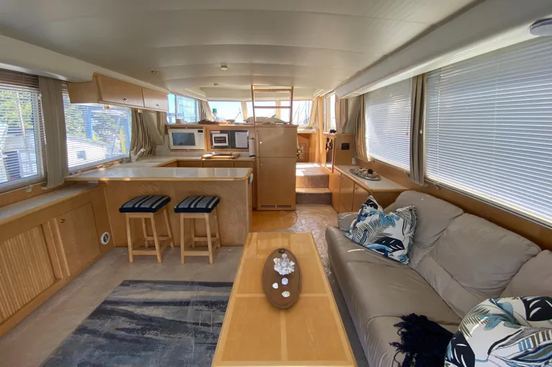 Slide: The Image of Interior of 1998 Navigator 5300 Classic yacht with modern galley and seating area. - 5