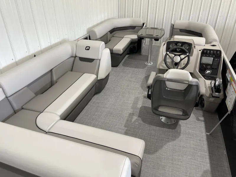 Slide: The Image of 2025 Princecraft Vectra 21 RL pontoon boat interior with modern seating and steering console. - 10