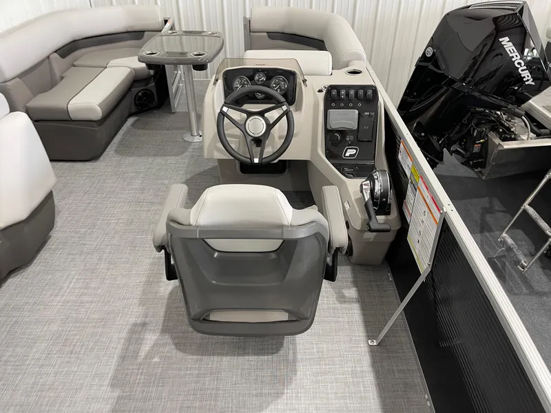 Slide: The Image of 2025 Princecraft Vectra 21 RL boat interior with steering console and seating. - 11