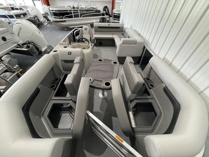 Slide: The Image of 2025 Princecraft Vectra 21 RL pontoon boat interior with spacious seating and modern design. - 17