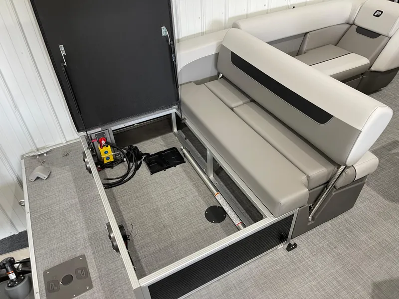 Slide: The Image of 2025 Princecraft Vectra 21 RL boat interior with open storage compartment and seating. - 6