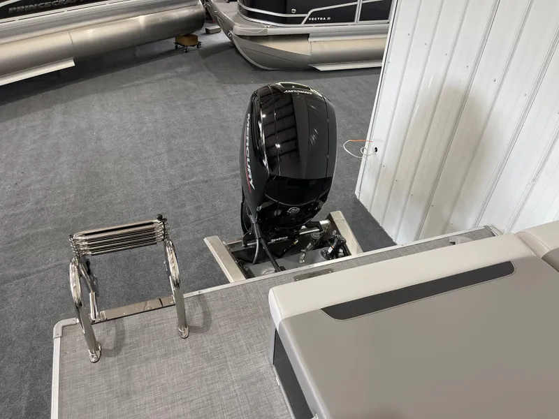 Slide: The Image of 2025 Princecraft Vectra 21 RL pontoon boat with outboard motor and boarding ladder. - 7