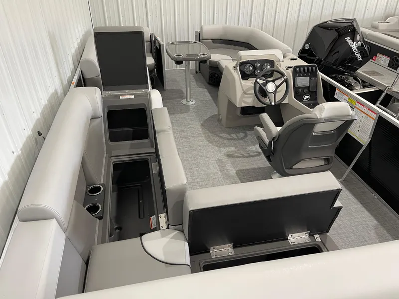 Slide: The Image of 2025 Princecraft Vectra 21 RL pontoon boat interior with seating and steering console. - 9