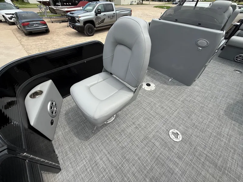 Slide: The Image of 2018 Misty Harbor 2085 Biscayne Bay FS boat interior with gray seating and carpeted floor. - 12