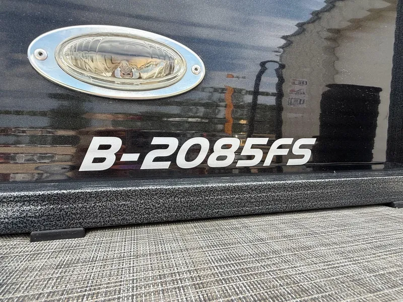 Slide: The Image of Close-up of Misty Harbor 2085 Biscayne Bay FS boat model emblem, 2018. - 2