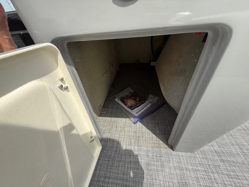 Slide: The Image of Open storage compartment on 2018 Misty Harbor 2085 Biscayne Bay FS boat. - 22