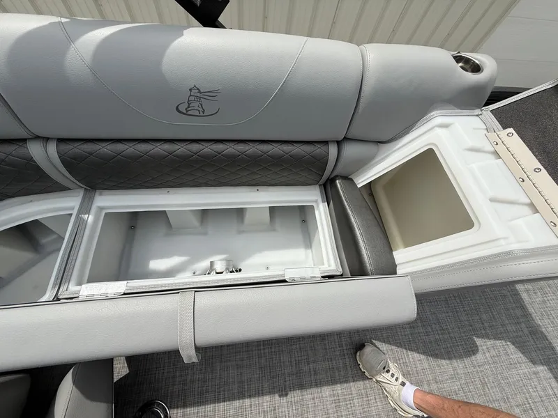 Slide: The Image of 2018 Misty Harbor 2085 Biscayne Bay FS boat seat storage compartments open. - 24
