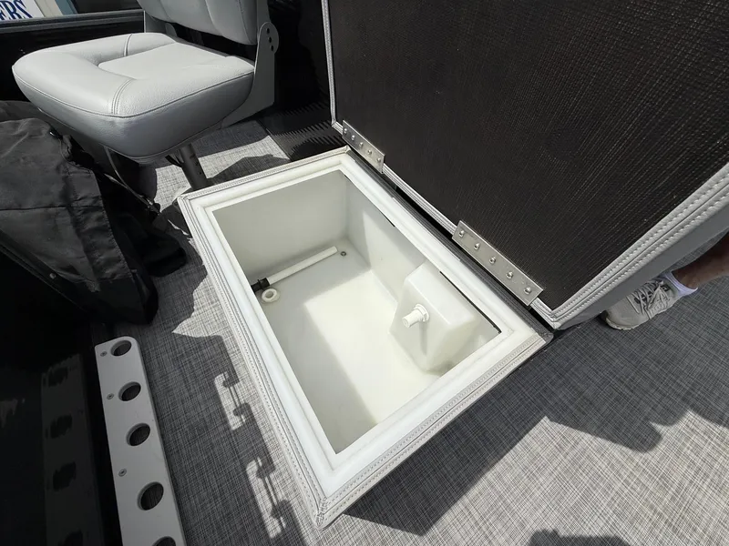 Slide: The Image of Open storage compartment on 2018 Misty Harbor 2085 Biscayne Bay FS boat. - 31