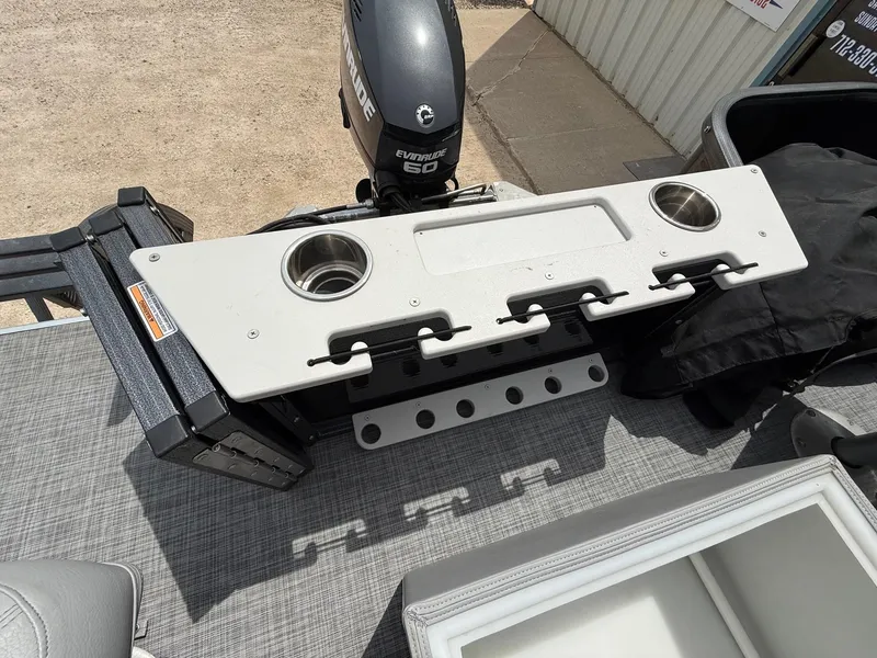 Slide: The Image of 2018 Misty Harbor 2085 Biscayne Bay FS boat with Evinrude 60 engine and fishing rod holders. - 32