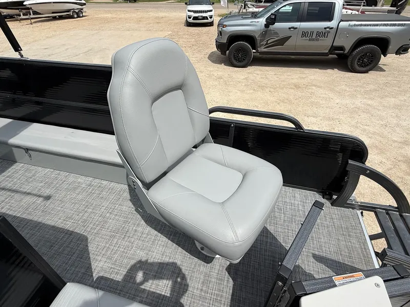 Slide: The Image of Gray seat on 2018 Misty Harbor 2085 Biscayne Bay FS boat, parked near a truck. - 34