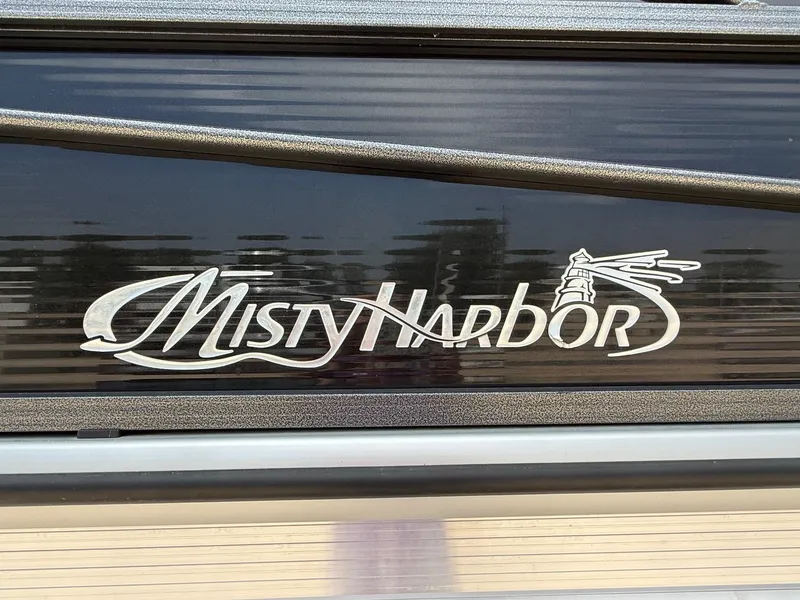 Slide: The Image of 2018 Misty Harbor 2085 Biscayne Bay FS logo on boat exterior. - 4
