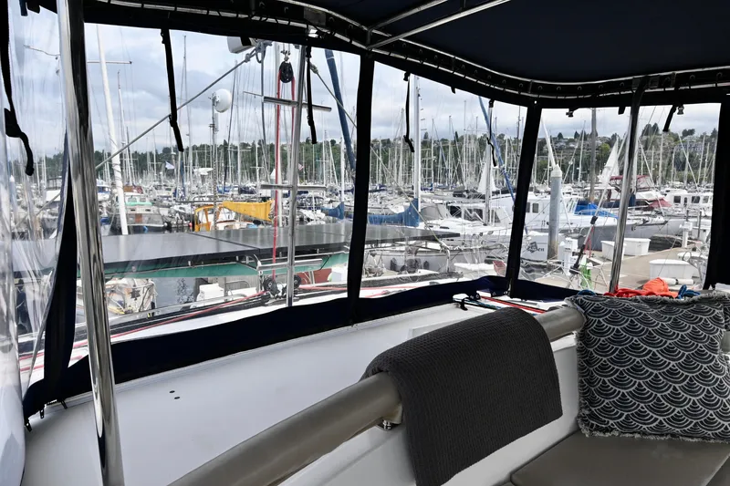 Slide: The Image of 2009 Lagoon 440 yacht interior with marina view through windows. - 12