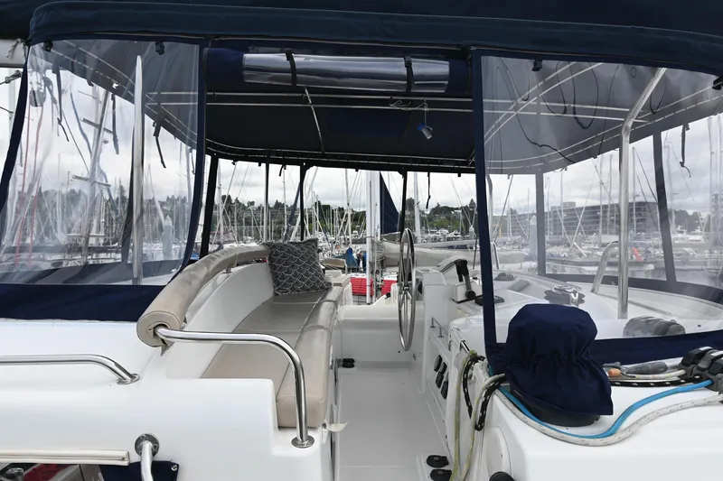 Slide: The Image of Lagoon 440 catamaran interior with seating and steering wheel, 2009 model. - 9